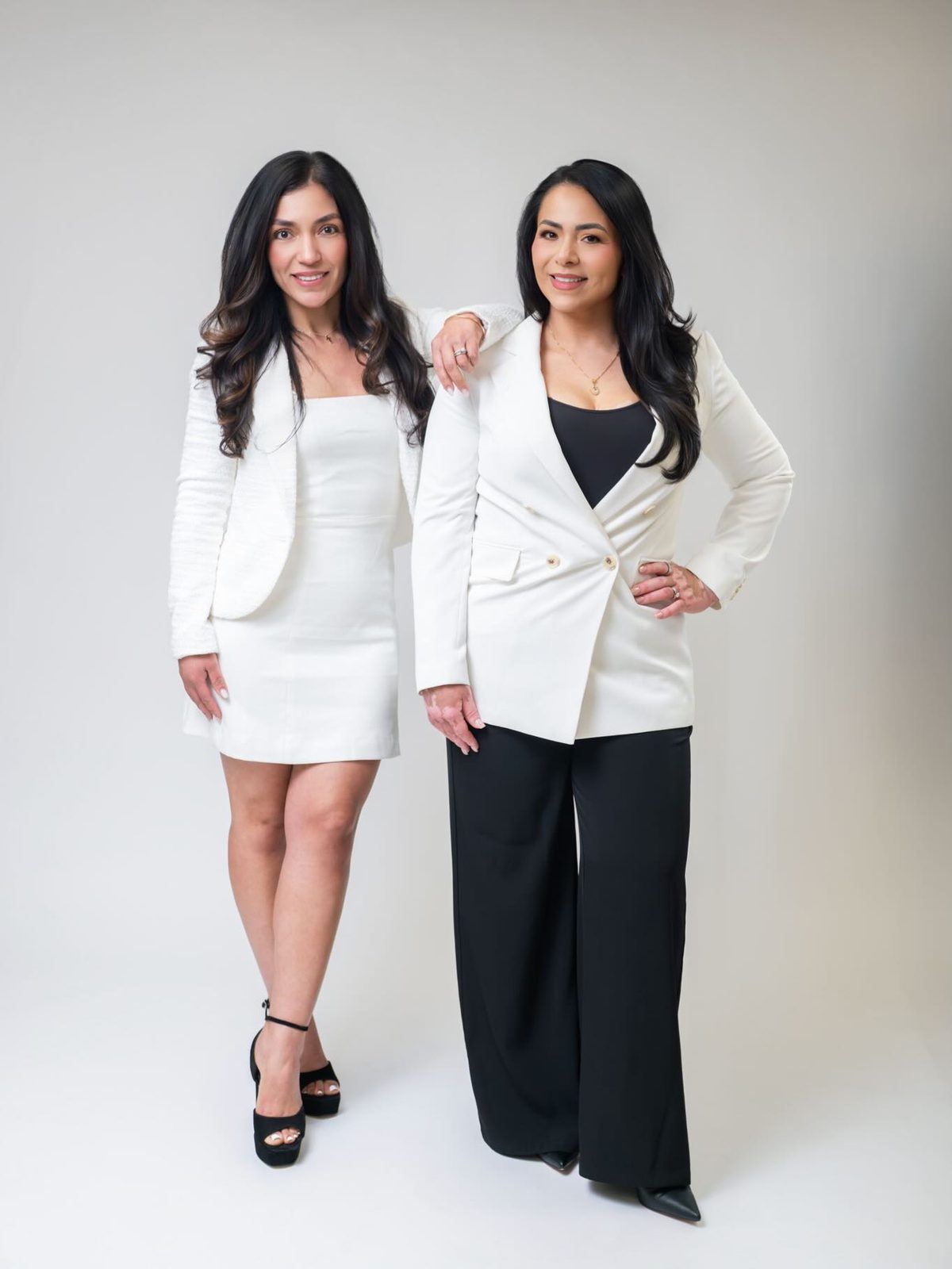 Two-person branding portrait in white tailoring