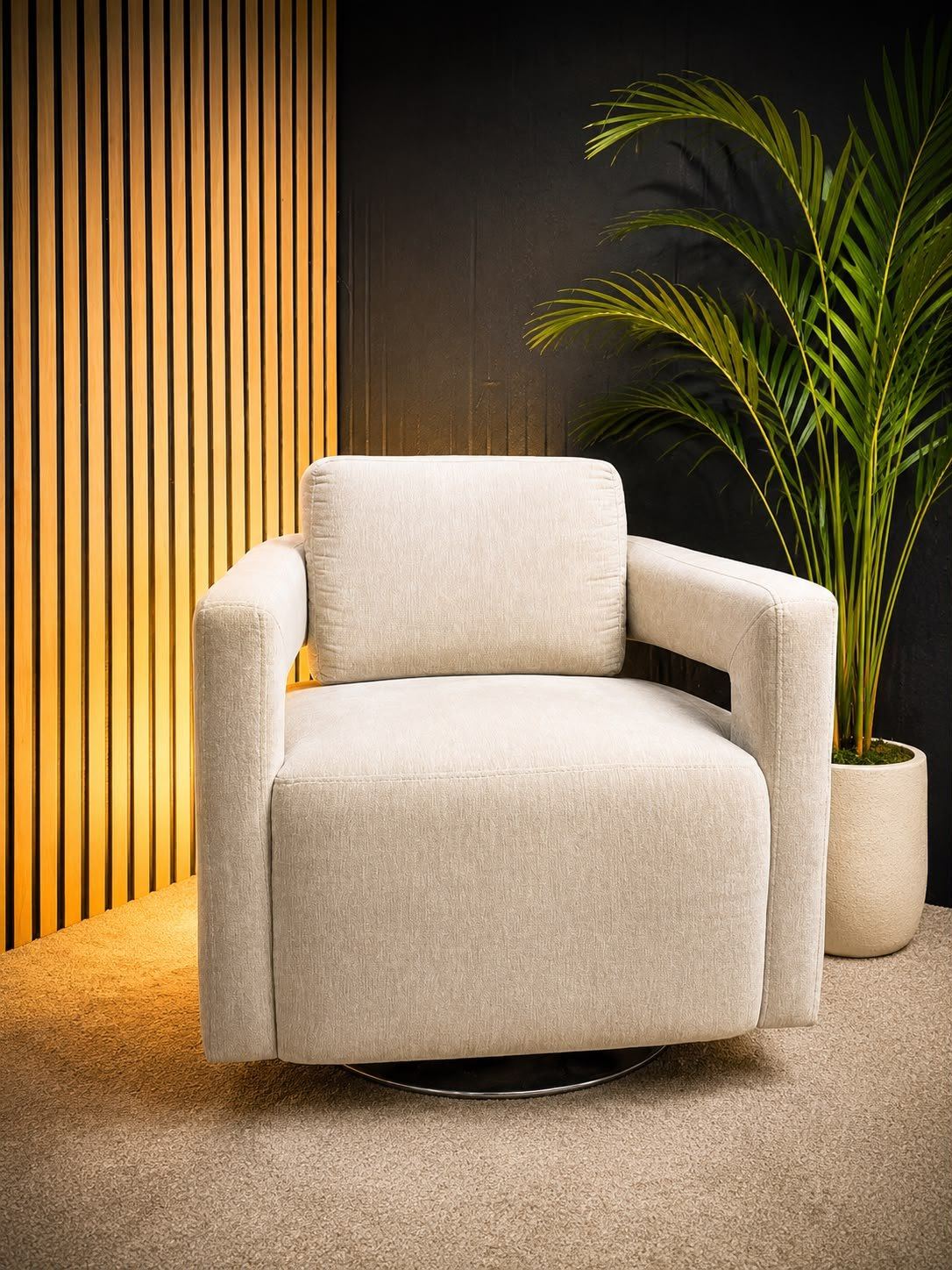 Lounge chair against a warm wood-slat wall